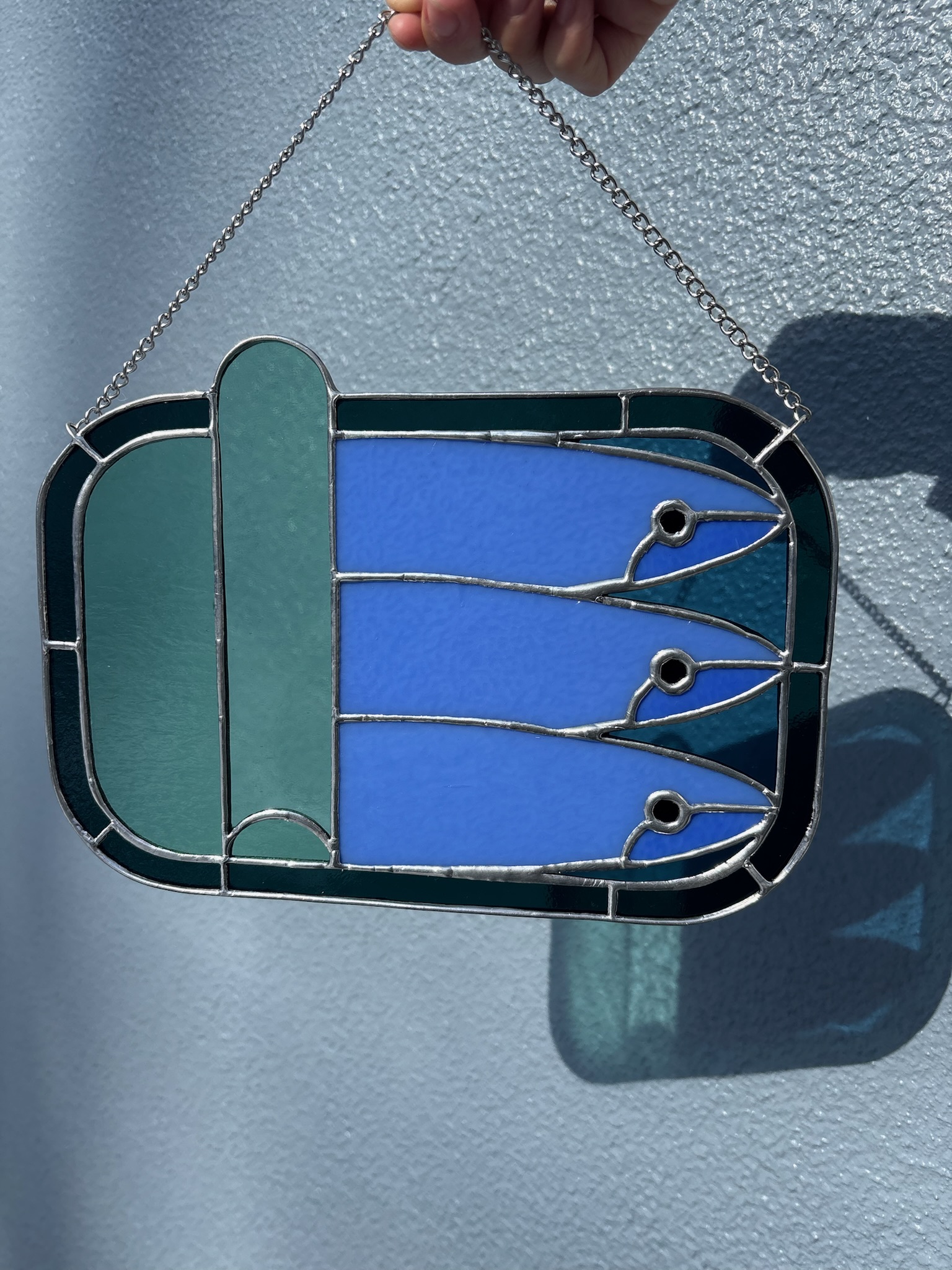 stained glass tinned fish